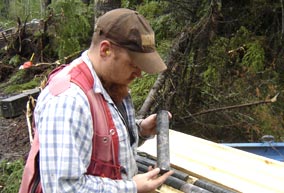 Dave Benson, Project Geologist, examines drill core from M2 Zone discovery hole