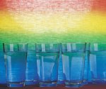 Series of tumblers with rainbow backdrop