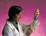 Technician testing water sample