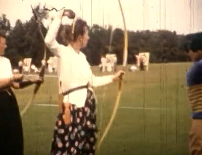 women shooting archery