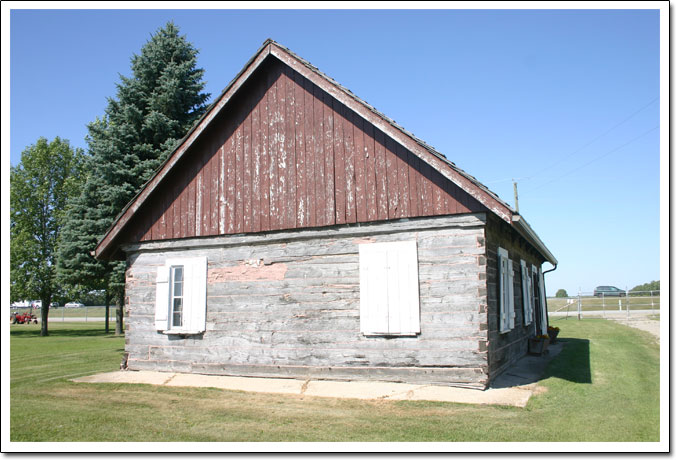 Maison mennonite à charpente pièce sur pièce Braun