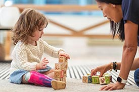 Occupational Therapist working with small child