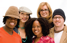 five people smiling at the camera