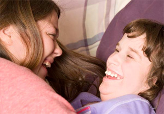 woman and child smiling at each other