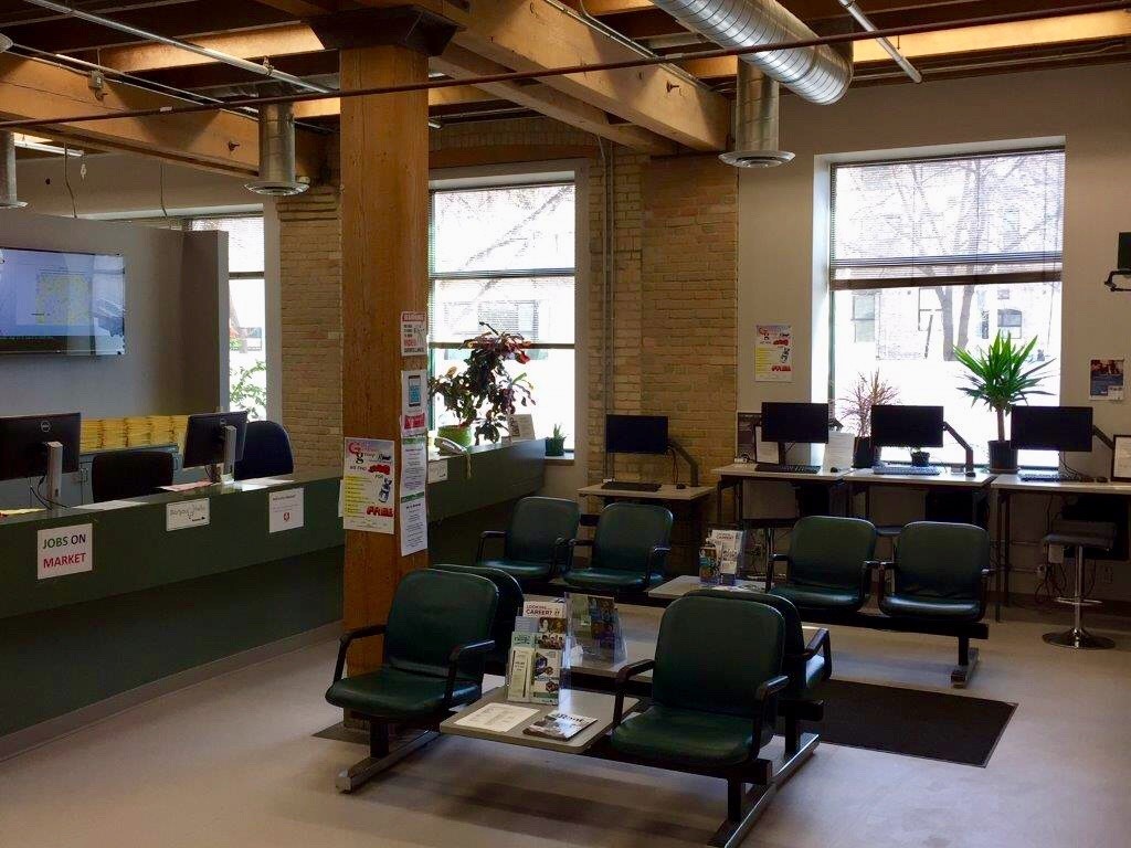 waiting area showing chairs and computer stations