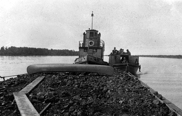 Ore from Mandy Mine, barged on Saskatchewan River to the Pas, 1918.