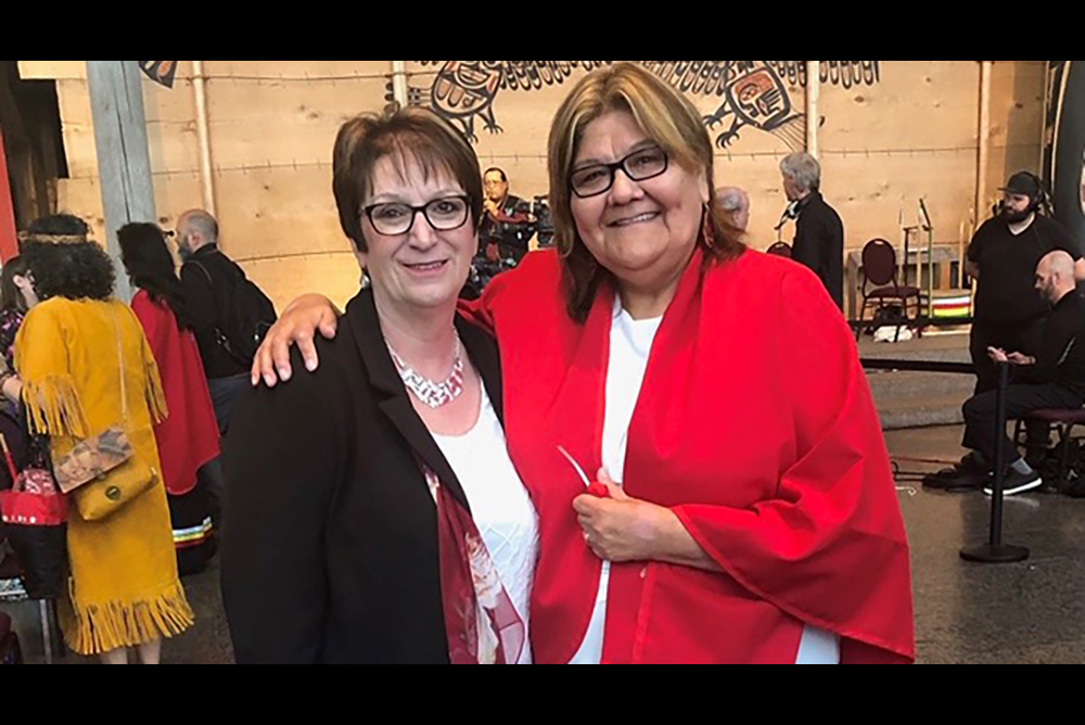 Minister Eileen Clarke with Darlene Osborne