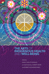 Book cover for The Arts of Indigenous Health and Well‑Being. At the top, brightly coloured flowers, berries, and vines form a circular pattern around a central wheel. White lightning‑like lines and roots extend downward across a purple and blue textured background. 