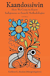 book cover showing an orange background with animals and flowers in an Indigenous art style