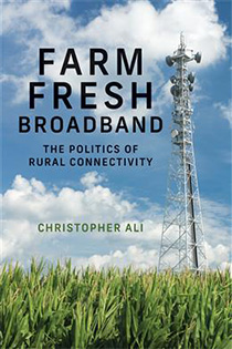 book cover showing a cell phone tower rising out os a field. In the back the sky is blue with some fluffy clouds