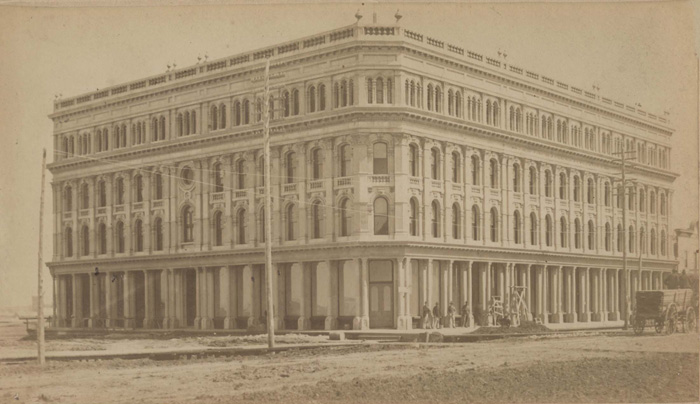 Photograph of the exterior of the Empire Hotel, c. 1885