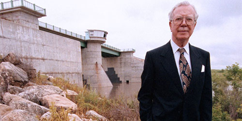 Mr. Duff Roblin in front of Floodway Gates